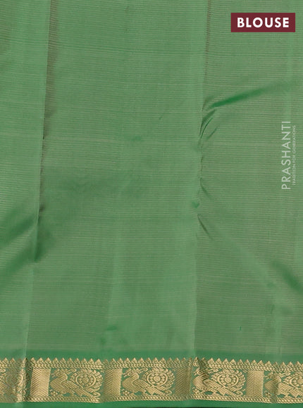 Pure kanchipuram silk saree pista green and green with zari woven buttas and zari woven border