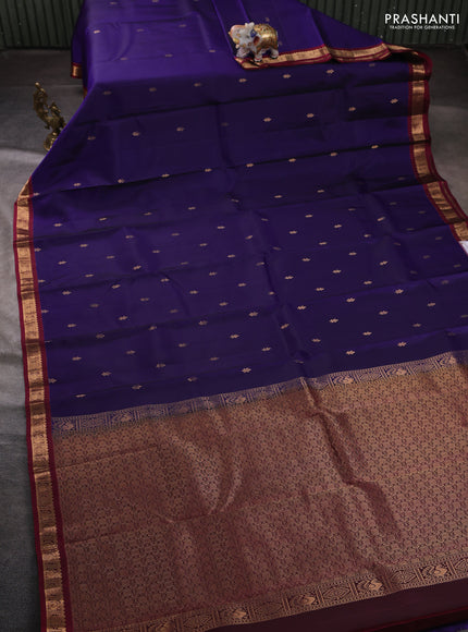 Pure kanchipuram silk saree blue and deep wine shade with allover zari woven buttas and small zari woven border