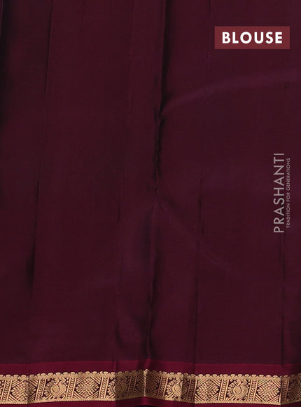 Pure kanchipuram silk saree blue and deep wine shade with allover zari woven buttas and small zari woven border