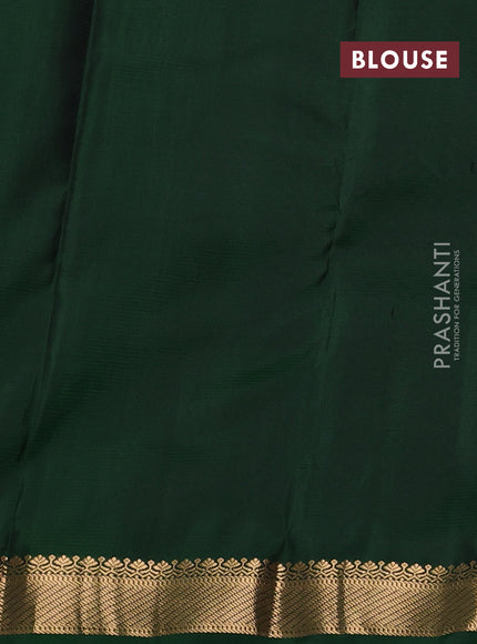 Pure kanchipuram silk saree bottle green with zari woven buttas and zari woven border