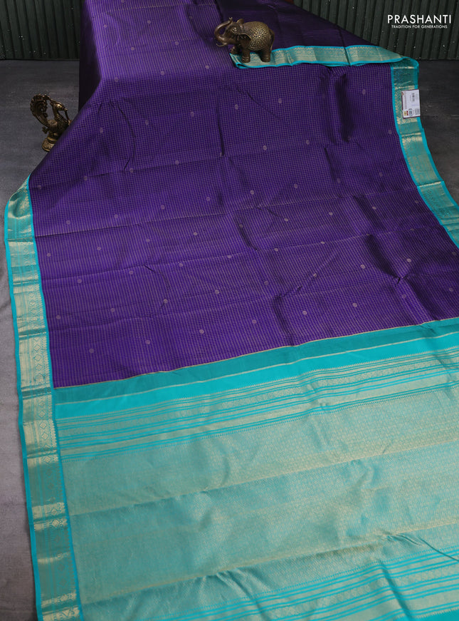 Pure kanchipuram silk saree violet and teal blue with allover zari checks & buttas and zari woven korvai border