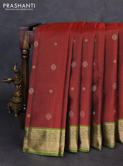 Pure kanchipuram silk saree rustic orange and light green with allover zari weaves & buttas and zari woven border