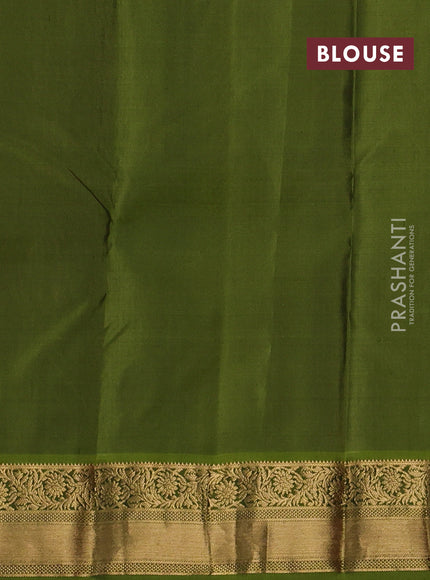 Pure kanchipuram silk saree rustic orange and light green with allover zari weaves & buttas and zari woven border