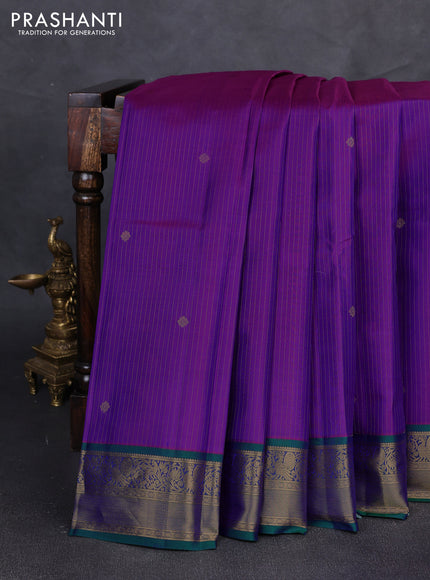 Pure kanchipuram silk saree purple and green with allover zari weaves & buttas and zari woven border