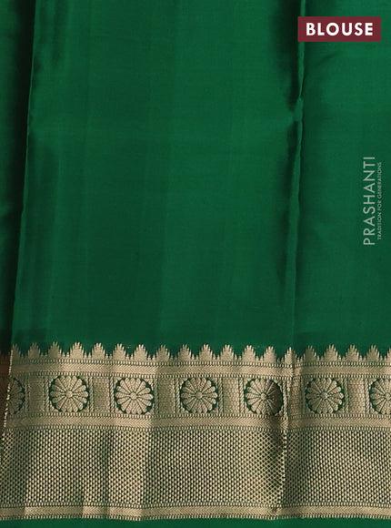 Pure kanchipuram silk saree rust shade and green with zari woven butttas and zari woven border
