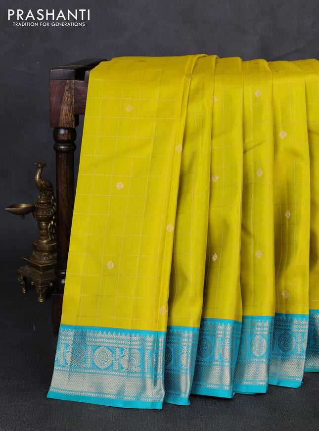 Pure kanchipuram silk saree lime green and teal blue with allover zari checks & buttas and zari woven korvai border