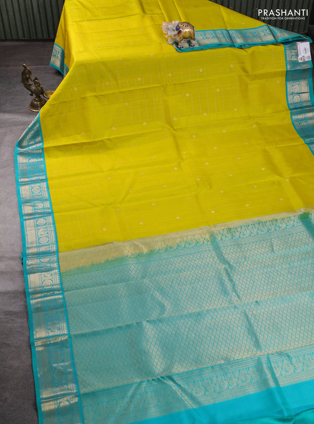 Pure kanchipuram silk saree lime green and teal blue with allover zari checks & buttas and zari woven korvai border
