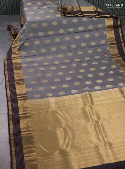 Pure kanchipuram silk saree grey and coffee brown with zari woven buttas and zari woven korvai border