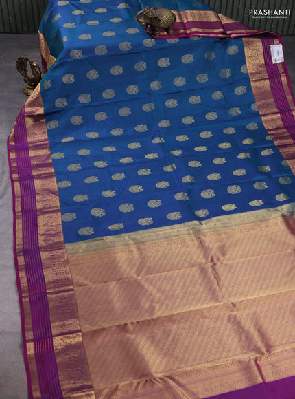 Pure kanchipuram silk saree peacock green and magenta pink with allover zari woven buttas and long zari woven korvai border
