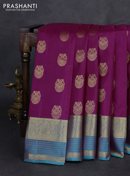 Pure kanchipuram silk saree magenta pink and teal green with allover zari woven buttas and long zari woven korvai border
