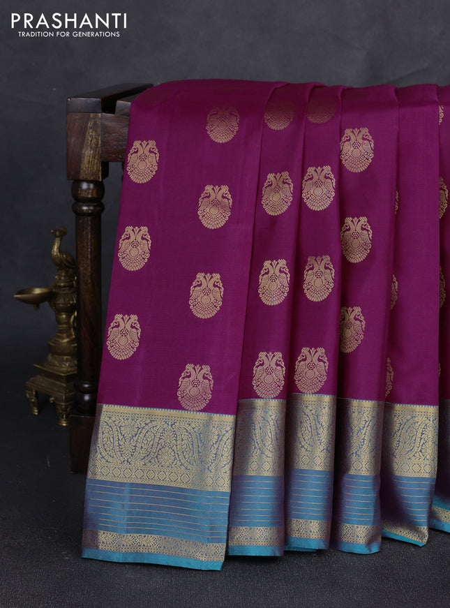 Pure kanchipuram silk saree magenta pink and teal green with allover zari woven buttas and long zari woven korvai border