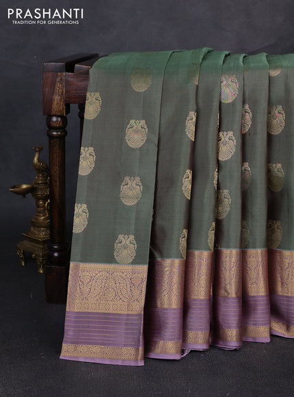 Pure kanchipuram silk saree pastel green and lavender with allover zari woven buttas and zari woven border