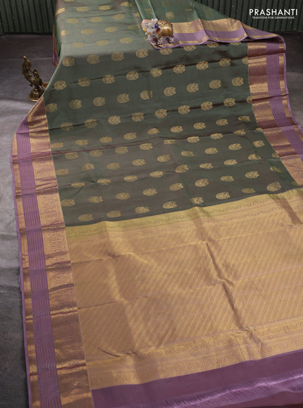 Pure kanchipuram silk saree pastel green and lavender with allover zari woven buttas and zari woven border