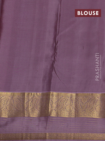 Pure kanchipuram silk saree pastel green and lavender with allover zari woven buttas and zari woven border