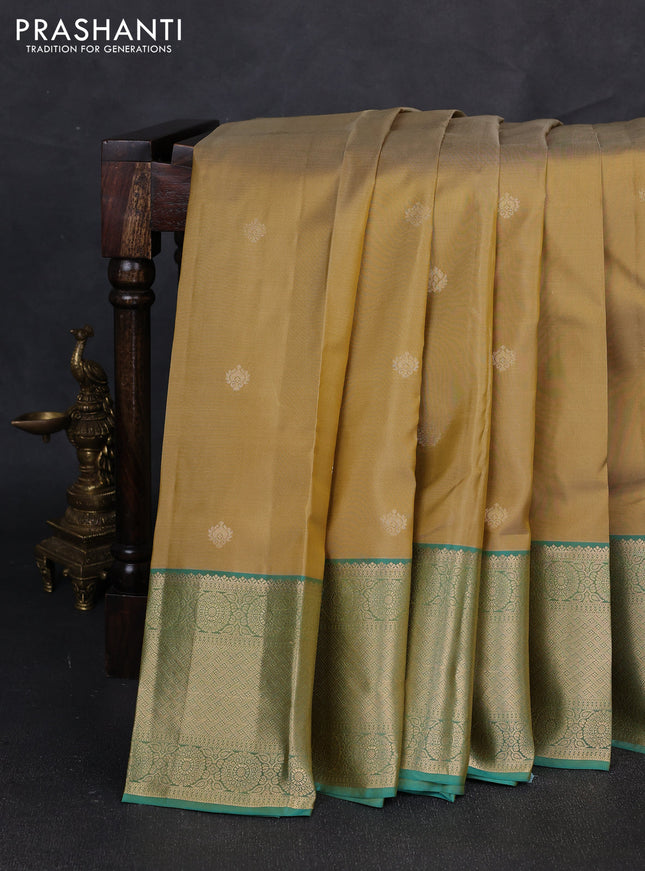 Pure kanchipuram silk saree sandal and light green with zari woven buttas and zari woven border