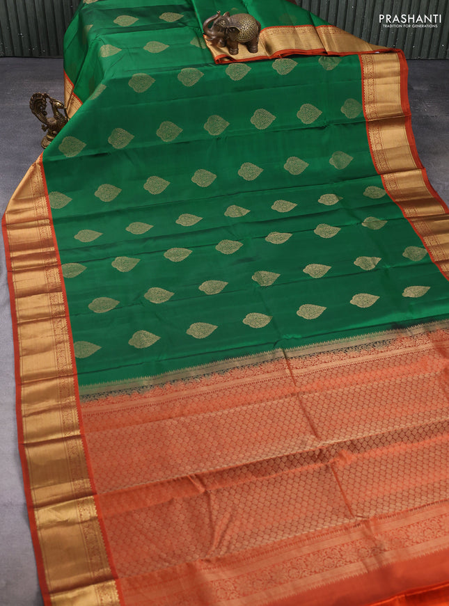 Pure kanchipuram silk saree green and orange with zari woven buttas and rettapet zari woven border