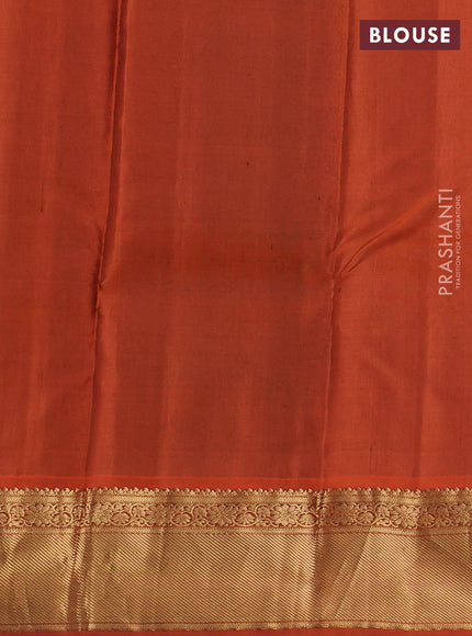 Pure kanchipuram silk saree green and orange with zari woven buttas and rettapet zari woven border