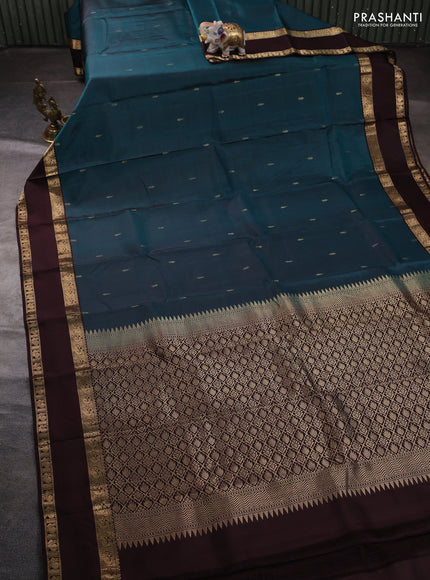 Pure kanchipuram silk saree peacock green and coffee brown with zari woven buttas and rettapet zari woven border