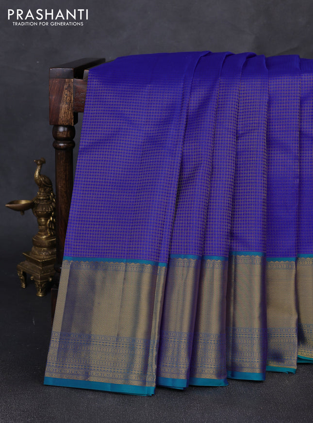 Pure kanchipuram silk saree royal blue and teal green with allover small zari checked pattern and long zari woven border
