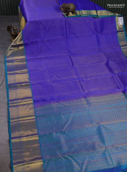 Pure kanchipuram silk saree royal blue and teal green with allover small zari checked pattern and long zari woven border