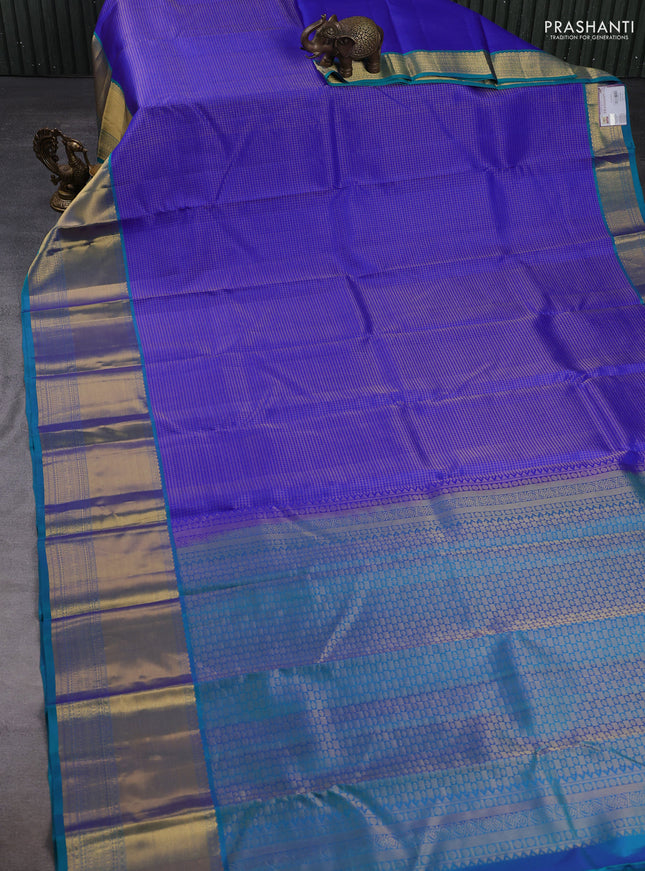 Pure kanchipuram silk saree royal blue and teal green with allover small zari checked pattern and long zari woven border