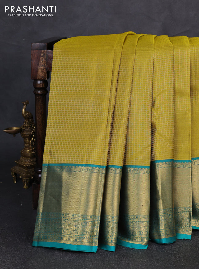 Pure kanchipuram silk saree mustard green and teal green with allover small zari checked pattern and long rich zari woven border