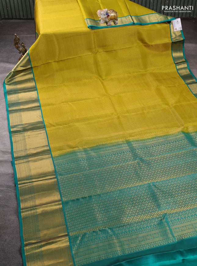 Pure kanchipuram silk saree mustard green and teal green with allover small zari checked pattern and long rich zari woven border