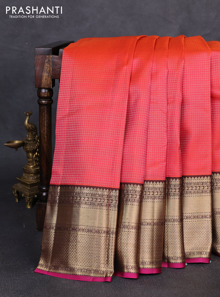 Pure kanchipuram silk saree orange and coffee brown with allover small zari checked pattern and long rich zari woven border