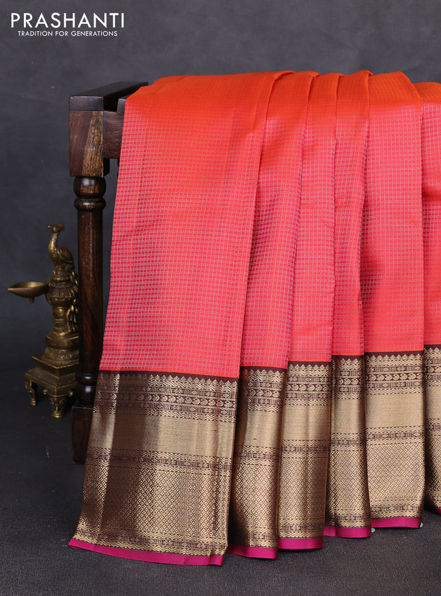 Pure kanchipuram silk saree orange and coffee brown with allover small zari checked pattern and long rich zari woven border