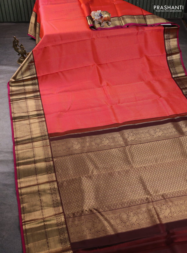 Pure kanchipuram silk saree orange and coffee brown with allover small zari checked pattern and long rich zari woven border