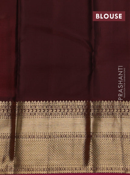 Pure kanchipuram silk saree orange and coffee brown with allover small zari checked pattern and long rich zari woven border