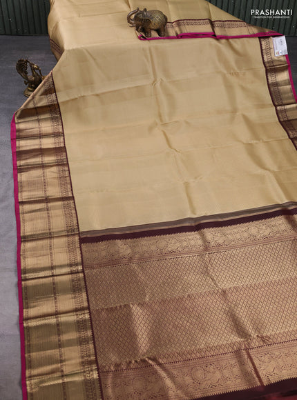 Pure kanchipuram silk saree sandal and coffee brown with allover small zari checked pattern and long rich zari woven border