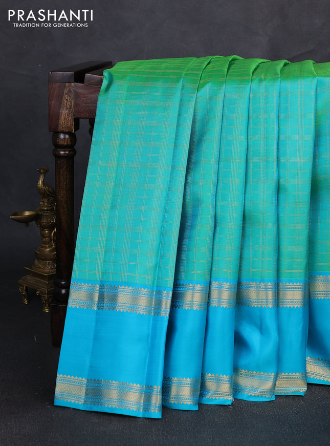 Pure kanchipuram silk saree teal green and teal blue with allover zari checked pattern and long rettapet zari woven border