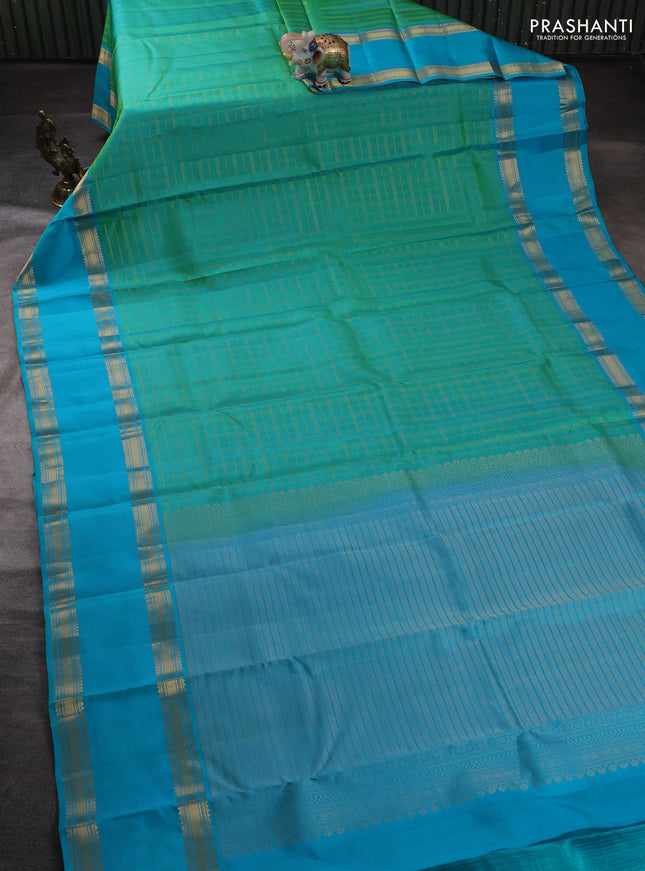 Pure kanchipuram silk saree teal green and teal blue with allover zari checked pattern and long rettapet zari woven border