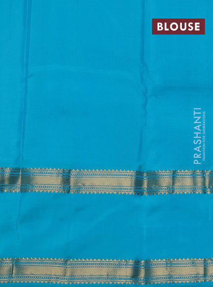 Pure kanchipuram silk saree pastel blue and teal blue with allover zari checked pattern and rettapet zari woven border