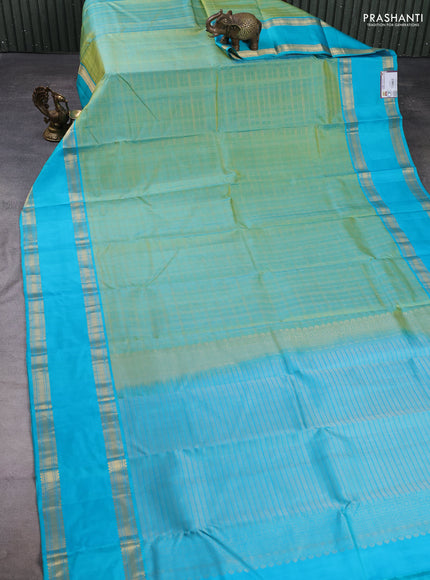 Pure kanchipuram silk saree teal green and teal blue with allover zari checks & buttas and rettapet zari woven border