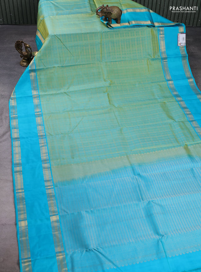 Pure kanchipuram silk saree teal green and teal blue with allover zari checks & buttas and rettapet zari woven border