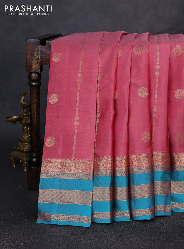 Pure kanchipuram silk saree peach pink and teal blue with allover zari weaves & buttas and long zari woven border