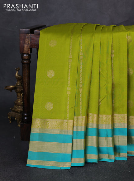 Pure kanchipuram silk saree light green and teal green with allover zari weaves & buttas and long zari woven border