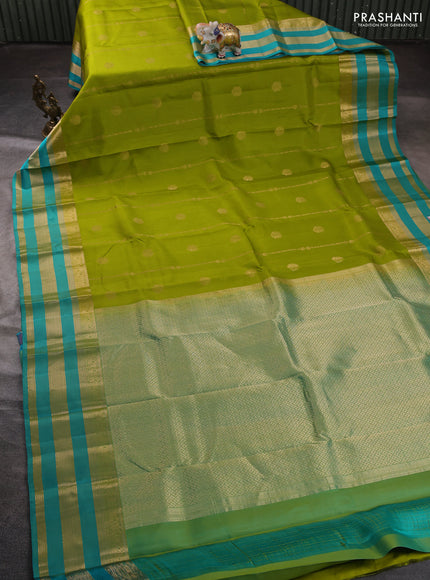 Pure kanchipuram silk saree light green and teal green with allover zari weaves & buttas and long zari woven border