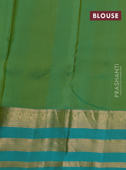 Pure kanchipuram silk saree light green and teal green with allover zari weaves & buttas and long zari woven border
