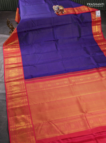 Pure kanchipuram silk saree blue and peach pink with allover zari checks & buttas and long zari woven korvai border