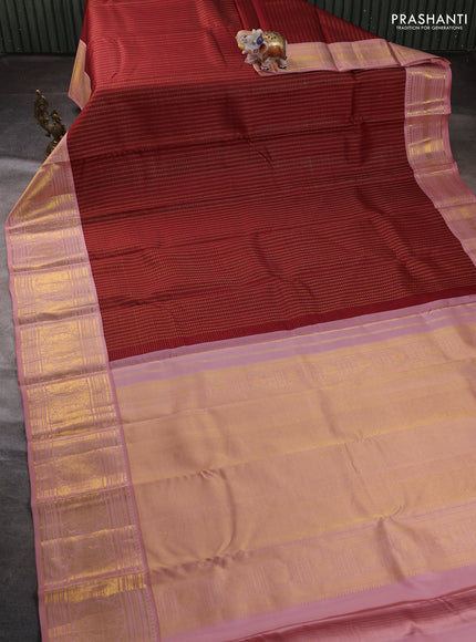 Pure kanchipuram silk saree deep maroon and pastel pink with allover zari checks & buttas and long zari woven korvai border