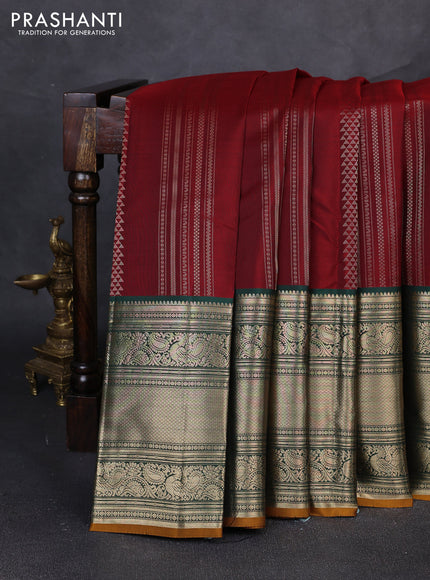 Pure kanchipuram silk saree maroon and green with allover zari weaves pattern and long zari woven korvai border