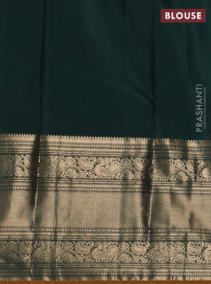 Pure kanchipuram silk saree rustic orange and green with allover zari weaves pattern and long zari woven border