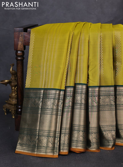 Pure kanchipuram silk saree mehendi green and green with allover zari weaves pattern and long zari woven border