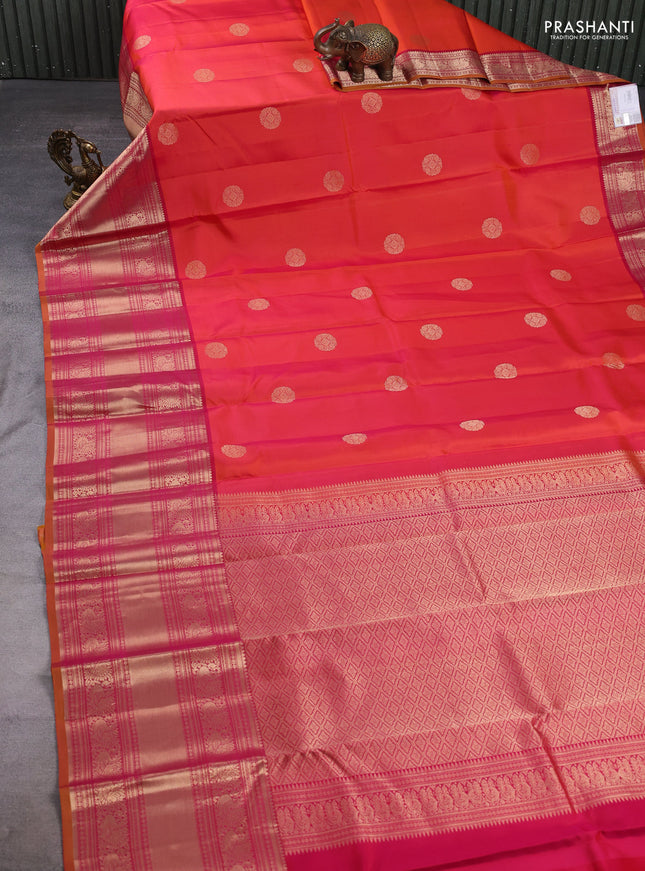 Pure kanchipuram silk saree dual shade of pinkish orange and maroon with allover zari rudraksha buttas and long zari woven border