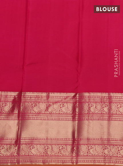 Pure kanchipuram silk saree dual shade of pinkish orange and maroon with allover zari rudraksha buttas and long zari woven border