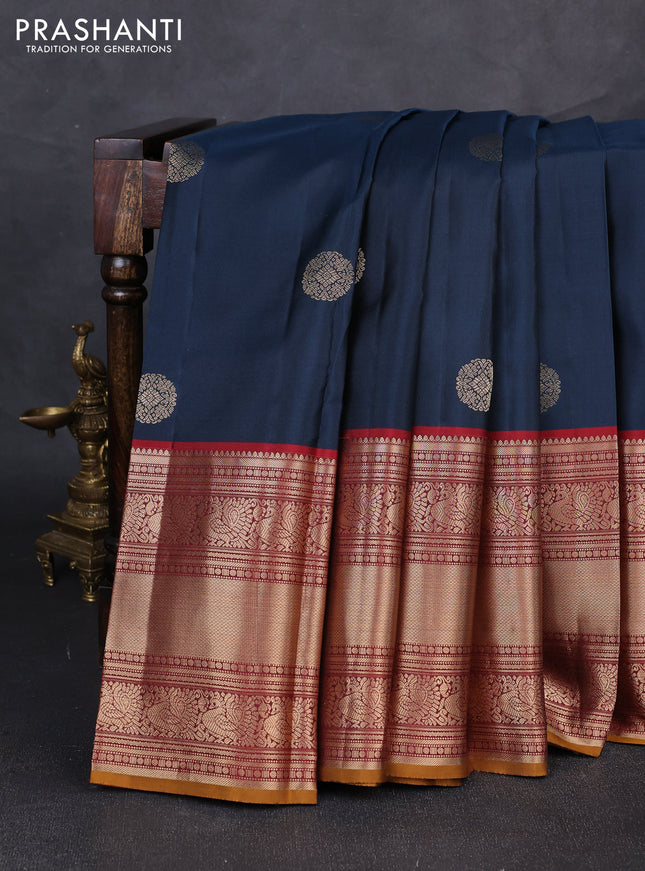 Pure kanchipuram silk saree peacock blue and maroon with allover zari rudraksha buttas and long zari woven border