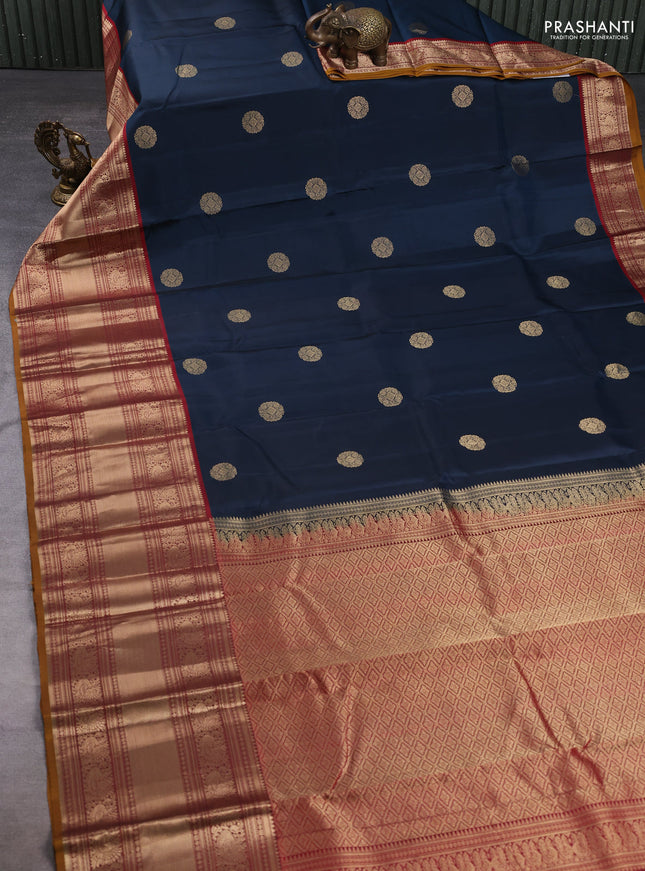 Pure kanchipuram silk saree peacock blue and maroon with allover zari rudraksha buttas and long zari woven border